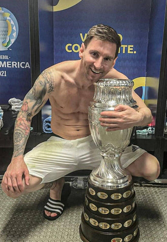 Lionel Messi with the 2021 Copa America Trophy - Football Great Poster- The Most Liked Sports Photo In Instagrams History - Framed Prints by Lionel